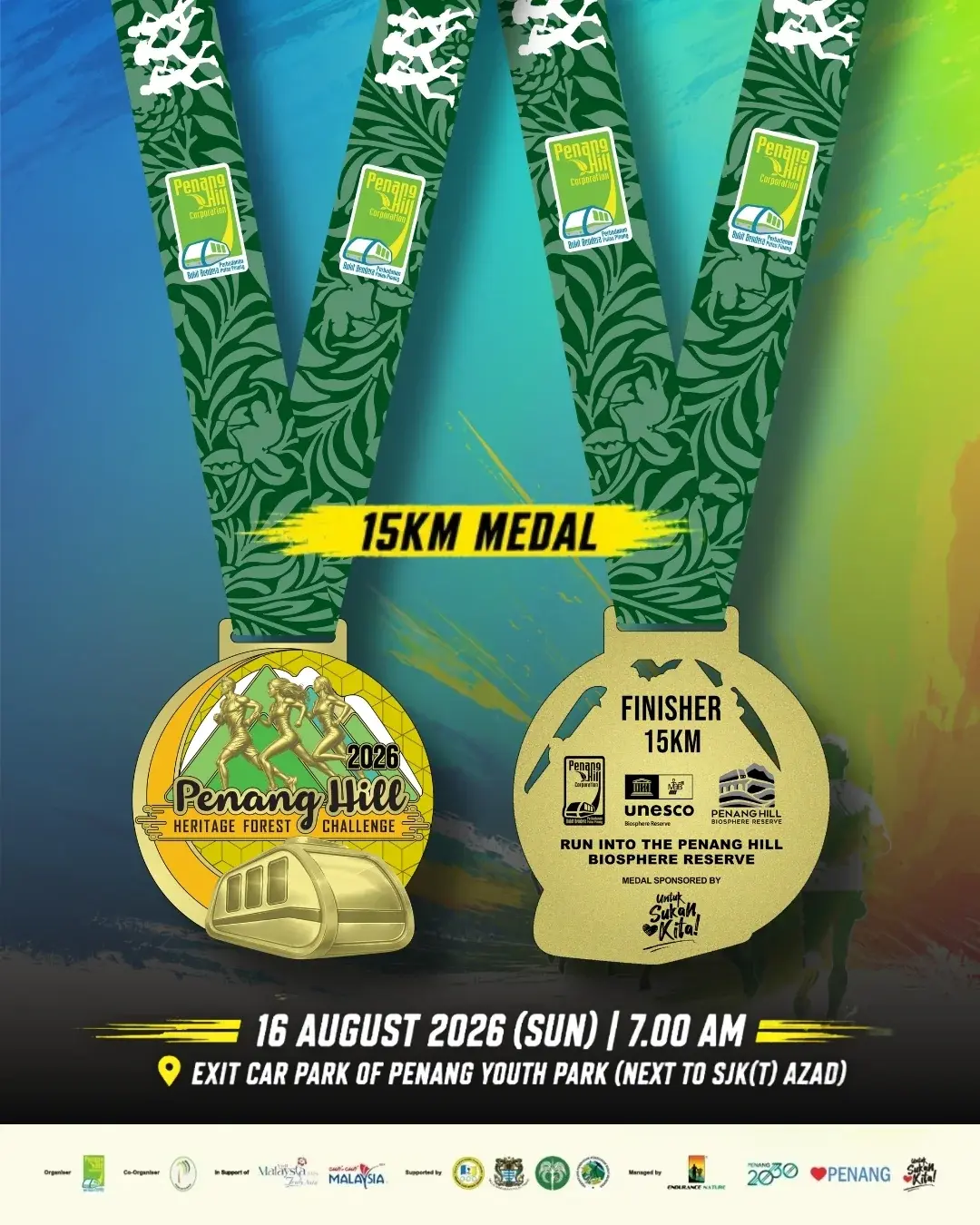 The 15 km medals hanging on green patterned ribbons.